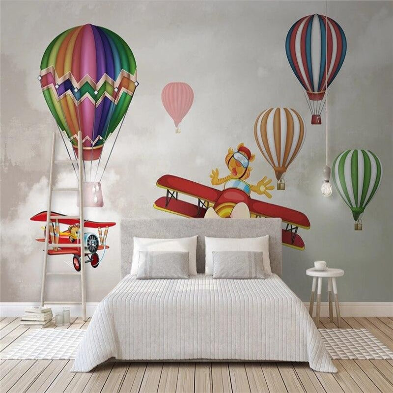 Chambre bébé garçon thème avion et montgolfières